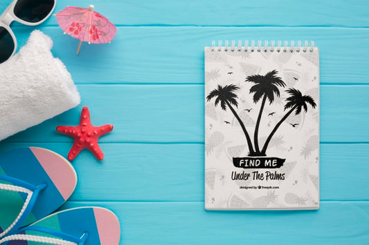 Free Flat Lay Summer Notepad With Flip Flops On The Table Psd