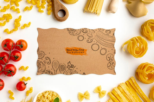 Free Flat Lay Uncooked Pasta Assortment And Tomatoes With Cardboard Mock-Up Psd