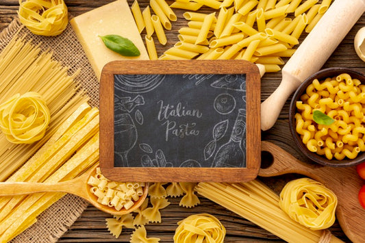 Free Flat Lay Uncooked Pasta Assortment With Blackboard Mock-Up Psd