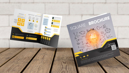 Free Floating Square Brochure Mockup Above Wooden Surface Psd