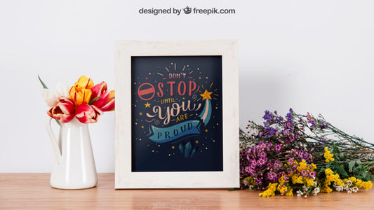 Free Floral Mockup Of Frame On Table Psd