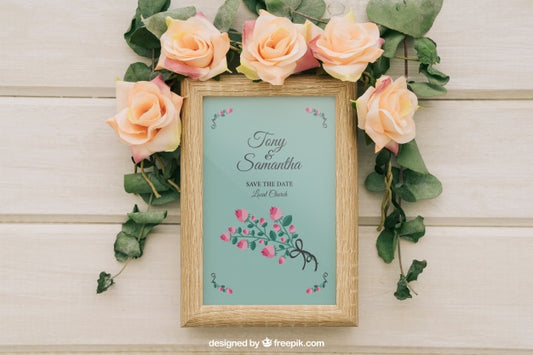 Free Flowers And Leaves Around Wooden Frame Psd