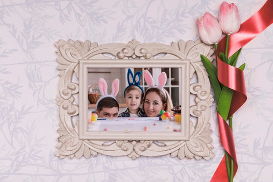 Free Flowers Beside Frame With Easter Family Photo Psd
