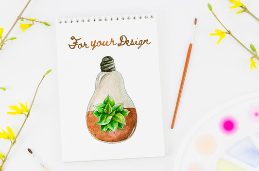 Free Flowers Next To Notebook With Draw Psd