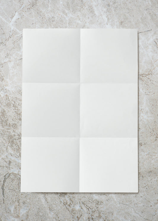 Free Folded Paper Crease On Marble Background