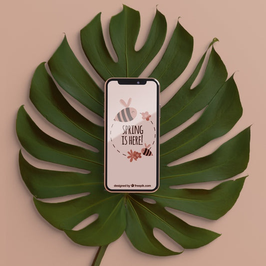 Free Foliage With Phone On Top Concept Psd