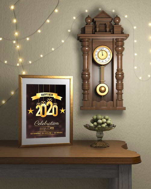 Free Frame Beside Watch On Wall With New Year Theme Psd
