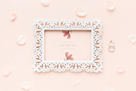 Free Frame Mock-Up And Wedding Rings With Flowers Psd