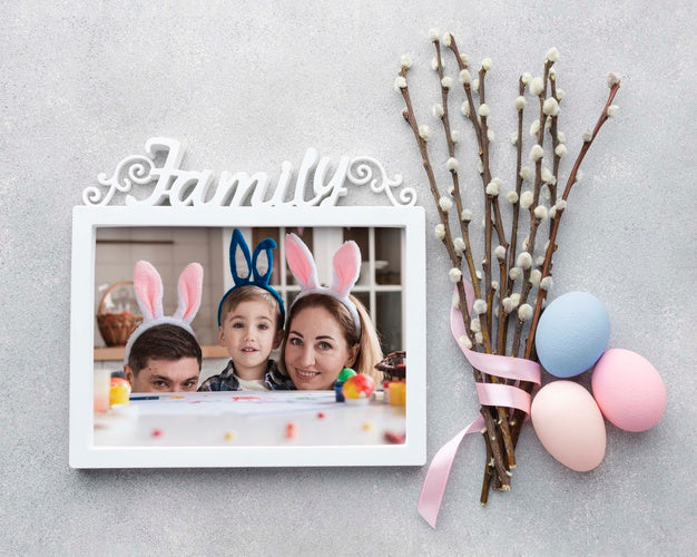Free Frame With Photos And Cotton Branches Psd