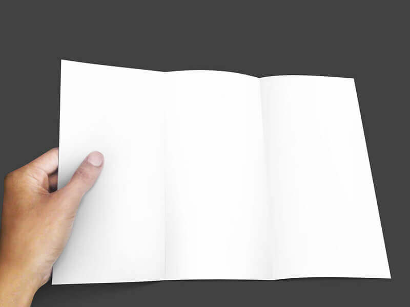 Free Trifold Brochure Mockup in a Hand