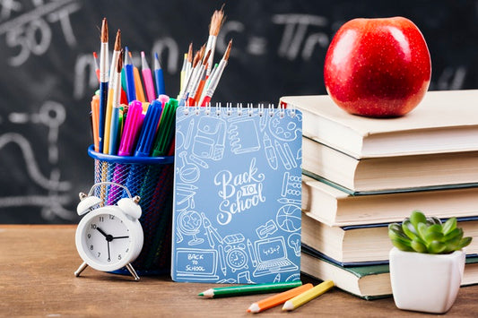 Free Front View Back To School Concept With Notepad Psd