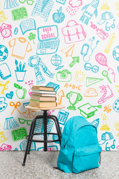 Free Front View Backpack With Pile Of Books Psd