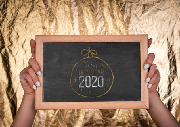 Free Front View Chalkboard With New Year Mock-Up Text And Hands Psd