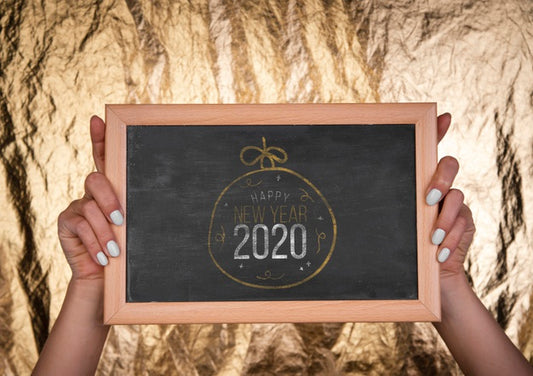 Free Front View Chalkboard With New Year Mock-Up Text And Hands Psd