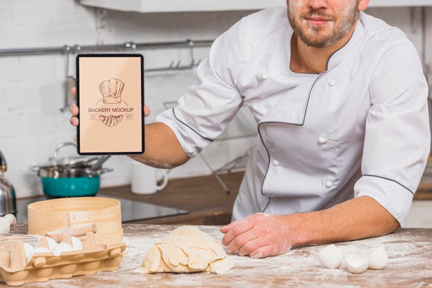 Free Front View Chef In The Kitchen Mock-Up Psd