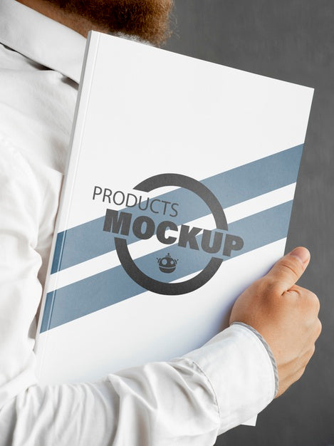 Free Front View Man Holding A Notebook Mock-Up Psd
