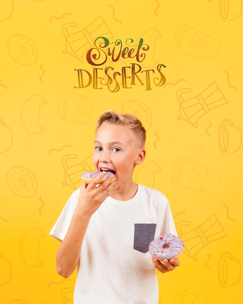 Free Front View Of Child Eating A Donut Psd