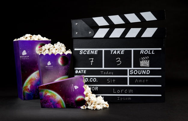 Free Front View Of Cinema Popcorn Cups With Clapperboard Psd