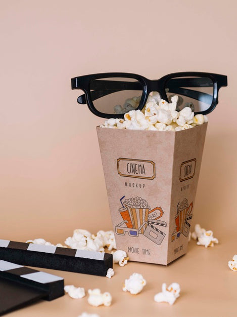 Free Front View Of Cinema Popcorn In Cup With Glasses Psd