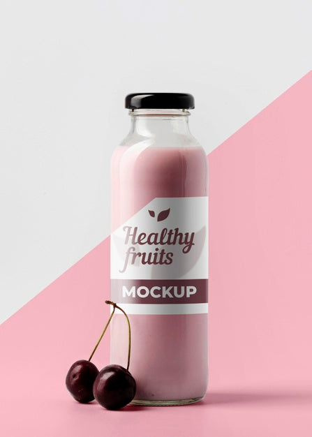 Free Front View Of Clear Juice Bottle With Cherries Psd