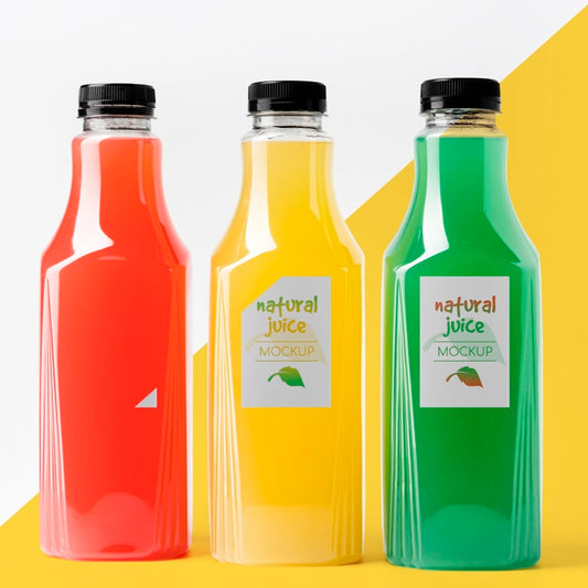 Free Front View Of Different Glass Juice Bottles Psd