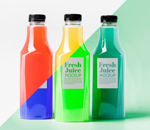Free Front View Of Different Transparent Juice Bottles With Caps Psd