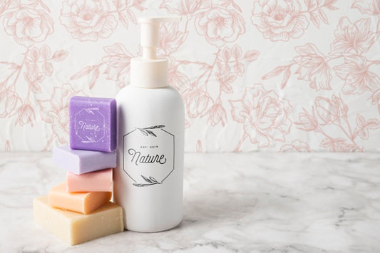 Free Front View Of Essential Oil And Colorful Soap Psd