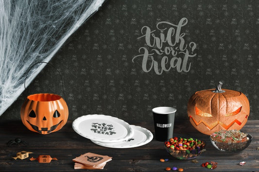 Free Front View Of Halloween Elements On Wooden Table Psd