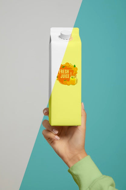 Free Front View Of Hand Held Juice Carton Psd