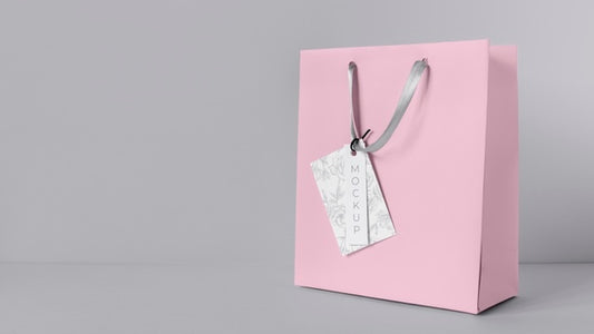 Free Front View Of Paper Shopping Bag Mock-Up With Paper Tag Psd