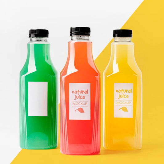 Free Front View Of Selection Of Clear Juice Bottles Psd
