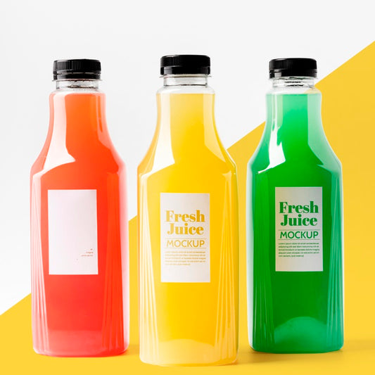 Free Front View Of Selection Of Juice Bottles Psd