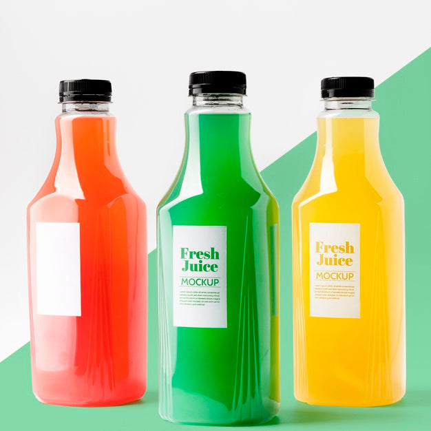 Free Front View Of Selection Of Transparent Juice Bottles Psd
