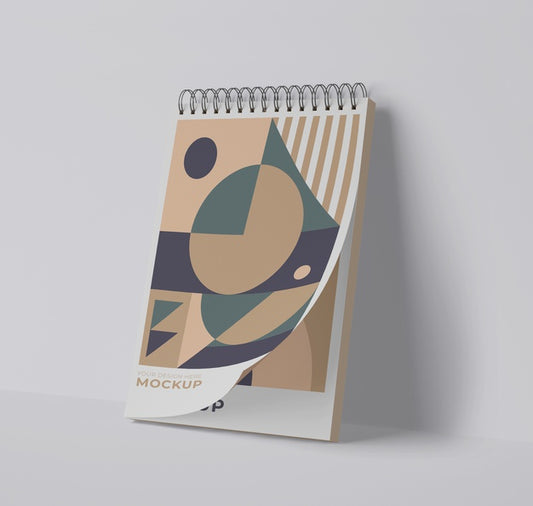 Free Front View Of Spiral Notebook With Geometric Shapes Psd