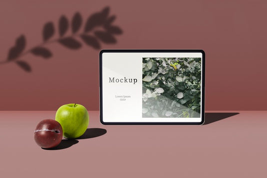Free Front View Of Tablet With Apple And Plum Psd