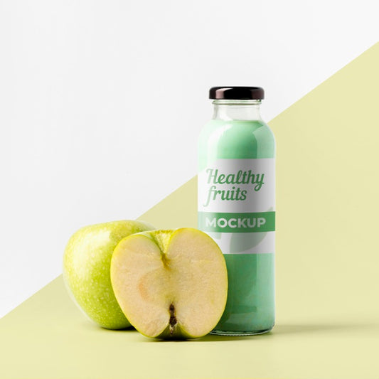 Free Front View Of Transparent Juice Bottle With Apples Psd