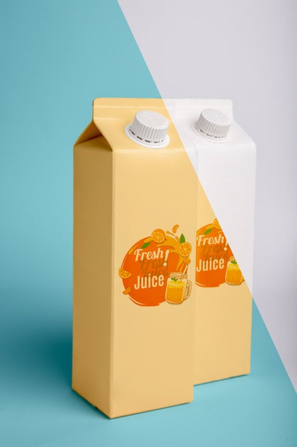 Free Front View Of Two Juice Cartons Psd
