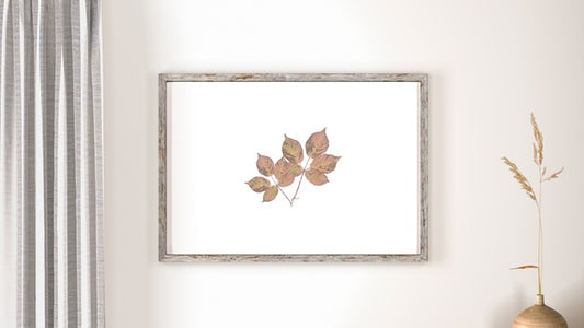 Free Front View Of Wall Decor With Frame And Vase Psd