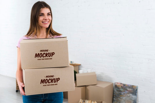 Free Front View Of Woman Holding Moving Boxes Mock-Up Psd