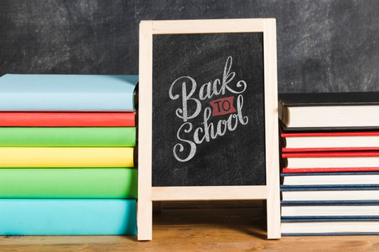 Free Front View Pile Of Books With Chalkboard Psd