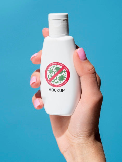 Free Front View Woman Hand Holding Disinfection Bottle Mock-Up Psd