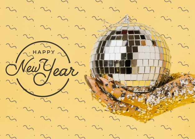 Free Front View Woman Holding Disco Ball With New Year Lettering Psd