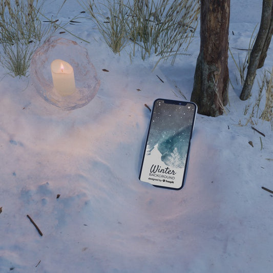 Free Frozen Scene With Phone And Candle Psd