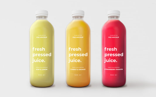 Free Fully Editable Mockup With Glass Bottles Of Different Flavours Psd