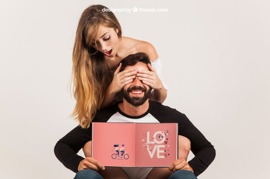Free Funny Couple Holding Open Book Psd