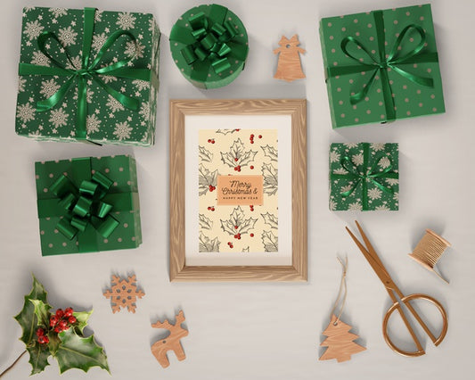 Free Gifts Wrapped In Green Paper Around Painting Psd