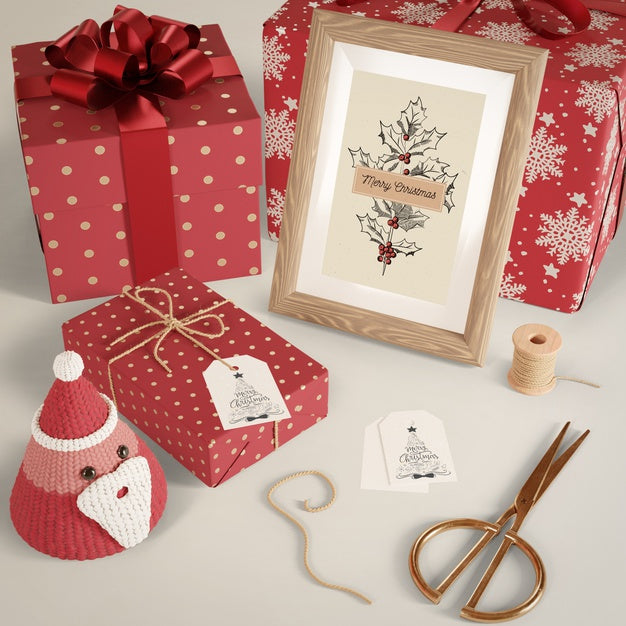 Free Gifts Wrapped In Red Paper On Table Psd