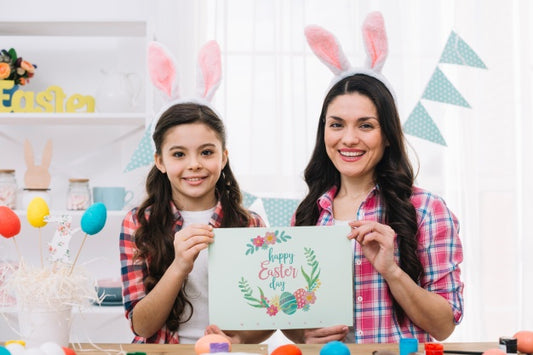 Free Girl And Mother With Card Mockup On Easter Day Psd