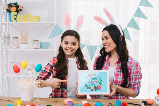 Free Girl And Mother With Tablet Mockup On Easter Day Psd