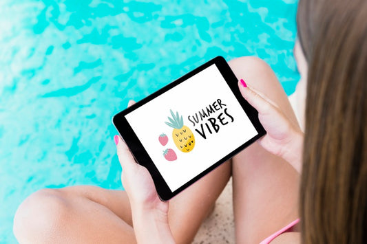 Free Girl Presenting Tablet Mockup Next To Pool Psd
